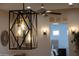 Geometric pendant lighting fixture with glass enclosures provides a modern feel at 18919 W Verde Ln, Litchfield Park, AZ 85340