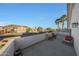 Enjoy the views from this balcony seating area with desert views and mature palm trees at 20709 N 56Th Dr, Glendale, AZ 85308