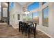 Bright dining area with large windows and modern light fixture perfect for entertaining at 20709 N 56Th Dr, Glendale, AZ 85308