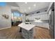 Gourmet kitchen features a large island, stainless steel appliances, and ample counter space at 20709 N 56Th Dr, Glendale, AZ 85308