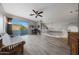 Bright and airy loft space featuring a comfortable sofa and a large sliding glass door at 20709 N 56Th Dr, Glendale, AZ 85308