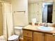 Bathroom with toilet, shower, and a vanity with a sink at 214 E Ruth Ave # 107, Phoenix, AZ 85020