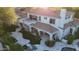 Aerial view of a backyard showcasing a pool, patio, landscaping, and spiral staircase at 22339 N 77Th Way, Scottsdale, AZ 85255