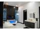 Stunning bathroom featuring a luxurious soaking tub, fireplace, and modern vanity with a lighted mirror at 22339 N 77Th Way, Scottsdale, AZ 85255