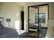 Bedroom view showing mirror closet doors, hardwood floor, and a grey duvet cover at 22339 N 77Th Way, Scottsdale, AZ 85255