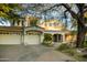 Spacious home with a three car garage, mature trees, and a tile roof at 22339 N 77Th Way, Scottsdale, AZ 85255