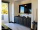Game room area with sliding glass doors and a flat screen television at 22339 N 77Th Way, Scottsdale, AZ 85255