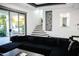 Living room with view to the outside, fireplace, staircase and built-in alcoves at 22339 N 77Th Way, Scottsdale, AZ 85255