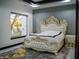 Luxurious main bedroom with a decorative headboard, neutral tones, and ample natural light at 22339 N 77Th Way, Scottsdale, AZ 85255