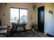 Bright office space featuring a large window with natural light and modern decor at 22339 N 77Th Way, Scottsdale, AZ 85255