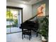 A grand piano in a well-lit room, inviting musical expression and enjoyment at 22339 N 77Th Way, Scottsdale, AZ 85255