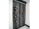 The wine rack displays a variety of wines, adding a touch of elegance to the space at 22339 N 77Th Way, Scottsdale, AZ 85255
