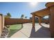 Backyard featuring a pool, desert landscaping, a putting green, and a covered patio at 22583 W Lasso Ln, Buckeye, AZ 85326