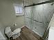 Elegant bathroom featuring tile shower and modern fixtures at 2318 N Nicklaus Dr, Mesa, AZ 85215