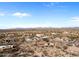 Aerial view of a desert community featuring single-Gathering homes surrounded by desert landscape at 2855 N Silver Spur Dr, Wickenburg, AZ 85390