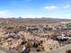 Aerial view of a Southwestern neighborhood nestled in a beautiful desert landscape at 2855 N Silver Spur Dr, Wickenburg, AZ 85390