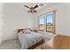 Bedroom featuring natural light, wood furniture, and a desert view at 2855 N Silver Spur Dr, Wickenburg, AZ 85390