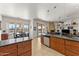 Open concept living space with kitchen, dining, and Gathering room combination at 2855 N Silver Spur Dr, Wickenburg, AZ 85390