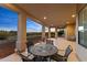 Relaxing covered patio, perfect for outdoor dining and entertaining at 2855 N Silver Spur Dr, Wickenburg, AZ 85390