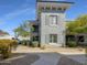 Well-kept condo building with meticulous stone landscaping and modern architectural accents at 295 N Rural Rd # 128, Chandler, AZ 85226