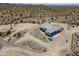 Desert home offering expansive acreage with panoramic views, blending luxury with natural beauty at 4289 W Caribou Ln, Queen Creek, AZ 85142
