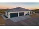 This home has a spacious two-car garage, providing ample space for vehicles and storage with a large parking area at 4289 W Caribou Ln, Queen Creek, AZ 85142