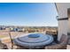 Outdoor seating area offers stunning city views and features a round table with four chairs at 4289 W Caribou Ln, Queen Creek, AZ 85142
