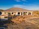 Beautiful home featuring a covered patio and fenced yard on a sprawling desert lot with stunning mountain views at 4289 W Caribou Ln, Queen Creek, AZ 85142
