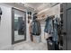 Well-organized walk-in closet with plenty of storage space, mirror, and ample room for clothes and accessories at 4289 W Caribou Ln, Queen Creek, AZ 85142