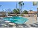 Backyard pool with a slide and plenty of room for lounging and recreation at 4415 W Laurie Ln, Glendale, AZ 85302