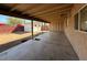 View of the patio overlooking the backyard with its privacy fence and outbuilding at 4621 N 47Th Dr, Phoenix, AZ 85031