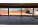 View of the backyard with a covered patio and a wooden fence surrounding the area at 4621 N 47Th Dr, Phoenix, AZ 85031