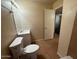 Bright bathroom featuring a single vanity, mirror and tile flooring at 4621 N 47Th Dr, Phoenix, AZ 85031