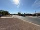 Neighborhood street view of a neighborhood with single-story homes and desert landscaping at 4621 N 47Th Dr, Phoenix, AZ 85031
