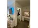 A stylish bedroom showcases a walk-in closet, modern vanity and sleek decor at 4845 W Marlette Ave, Glendale, AZ 85301