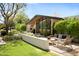 Inviting outdoor patio area with stylish seating and lush landscaping at 6301 E Exeter Blvd, Scottsdale, AZ 85251