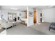 Comfortable living area featuring an armchair, built-in shelves, and lots of natural light at 6301 E Exeter Blvd, Scottsdale, AZ 85251
