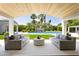 Luxurious outdoor living space with comfortable seating and pool view at 6301 E Exeter Blvd, Scottsdale, AZ 85251