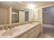 Bathroom featuring double sinks with an ornate tile countertop, and a walk-in shower at 6701 N Scottsdale Rd # 23, Scottsdale, AZ 85250