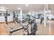 Large fitness center equipped with modern exercise machines, weightlifting equipment, mirrors, and durable flooring at 6701 N Scottsdale Rd # 23, Scottsdale, AZ 85250