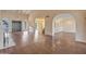 Open-concept living area with hardwood floors, neutral walls, and high ceilings at 6701 N Scottsdale Rd # 23, Scottsdale, AZ 85250