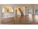 Inviting living space featuring hardwood floors, staircase, and arched openings at 6701 N Scottsdale Rd # 23, Scottsdale, AZ 85250
