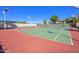 Outdoor tennis courts featuring professional surface, surrounded by lush landscaping and clear blue skies at 6701 N Scottsdale Rd # 23, Scottsdale, AZ 85250