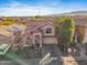 Two-story home featuring a red tile roof and attached two-car garage at 8613 S 49Th Dr, Laveen, AZ 85339