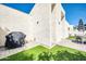 Backyard patio with grill, artificial grass, and outdoor dining for easy outdoor living at 930 S Dobson Rd # 41, Mesa, AZ 85202