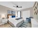 Well-lit bedroom featuring modern decor, plush bed, and access to an outdoor space at 930 S Dobson Rd # 41, Mesa, AZ 85202