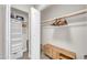 Organized walk-in closet featuring built-in shelving and ample storage space with convenient safe at 930 S Dobson Rd # 41, Mesa, AZ 85202