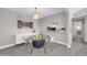 Bright dining area with modern furnishings and wood-look flooring at 930 S Dobson Rd # 41, Mesa, AZ 85202