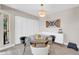 Cozy dining area with a glass table, and stylish decor at 930 S Dobson Rd # 41, Mesa, AZ 85202