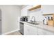 Bright modern kitchen with white cabinets, stainless steel appliances, and subway tile backsplash at 930 S Dobson Rd # 41, Mesa, AZ 85202